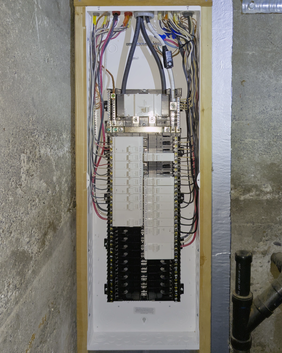 A new white electrical breaker panel